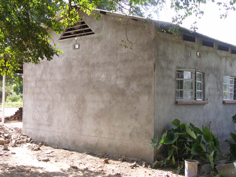 09 The gable end plastered and the new roof on