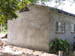 09 The gable end plastered and the new roof on