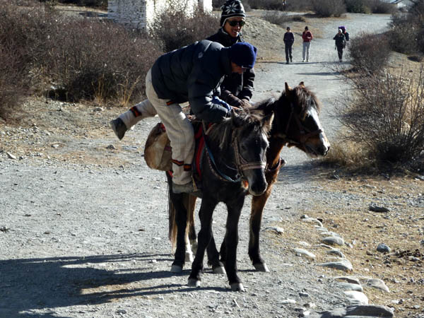 03 Tow Nepalese riders dismounting