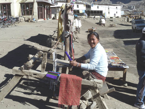 08 The weaver at her loom