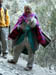 13 Lady carrying tin roofing along the track and spinning at the same time