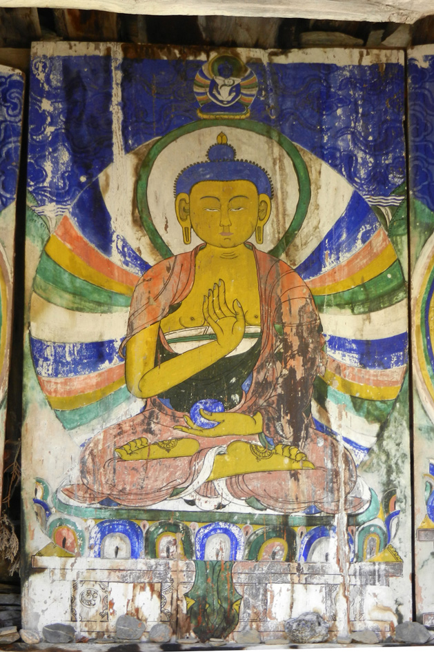 09 A Buddha painted inside a trail-side stupa