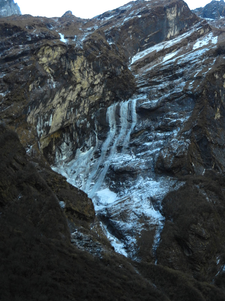 02 Frozen waterfalls on the east side of the valley below Machhapuchhre