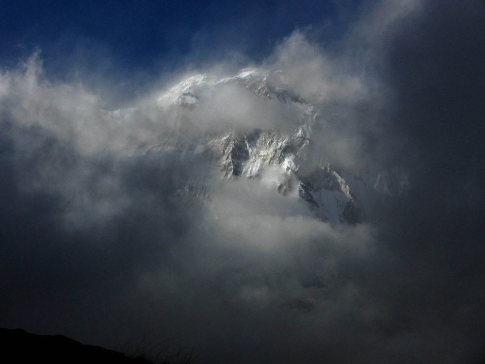 16 Annapurna I makes a dramatic appearance out of the mists