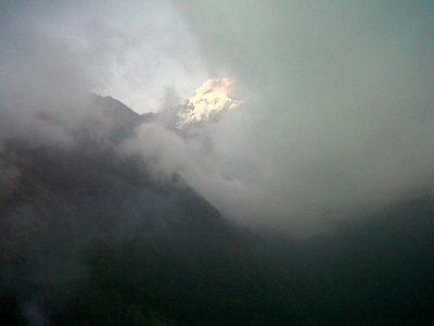 07 Annapurna South appears out of the mist at Chhomrong