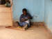 17 Mbaza waiting with his radio in front of Badat's Hardware where we get the Clinic supplies